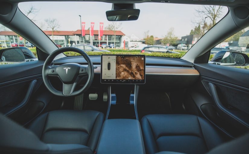 The government is investigating why Tesla drivers can play solitaire at the wheel